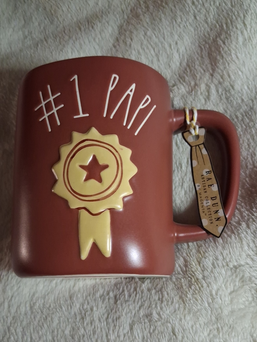 Rae Dunn Rust Ceramic Mug with Yellow Ribbon and White Lettering